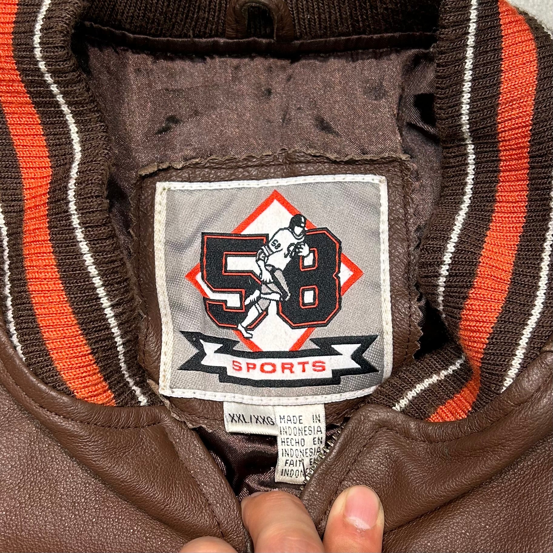 ウールレザー スタジャン ブラウンオレンジ 古着 NFL CLEVELAND BROWNS/ クリーブランド ブラウンド/ レザー